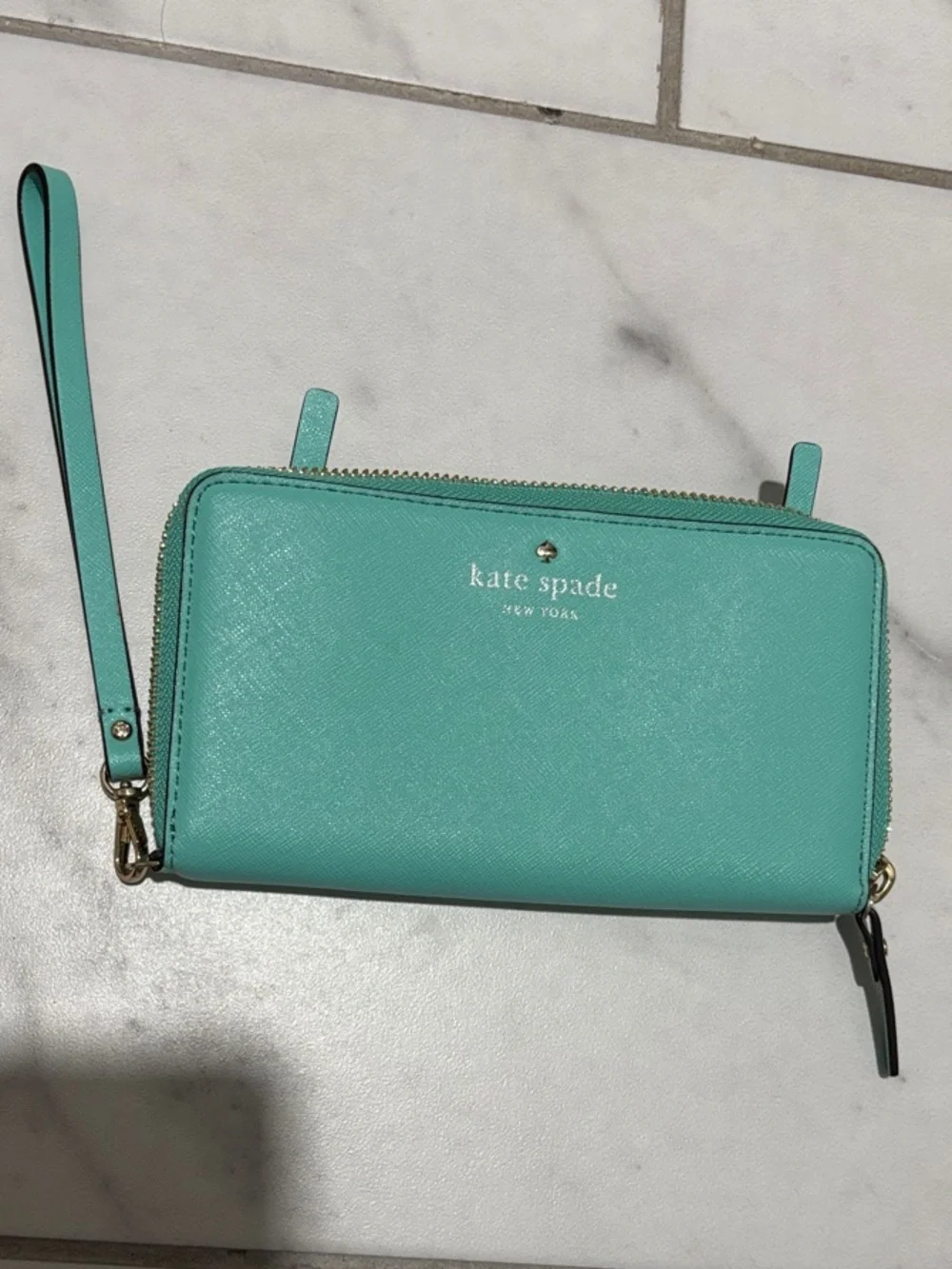 kate spade turquoise zip around wallet with gold hardware